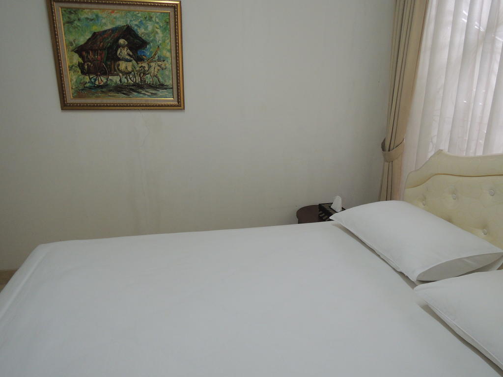 Rumah Polonia Guest House Джакарта Номер фото