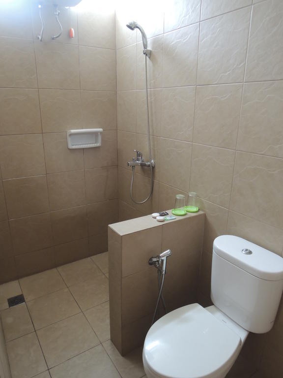 Rumah Polonia Guest House Джакарта Номер фото